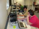In the right foreground, husband and wife team Joe Speakman NO4FX and Kristin Speakman KG4MYG operating 20m and 15m respectively.